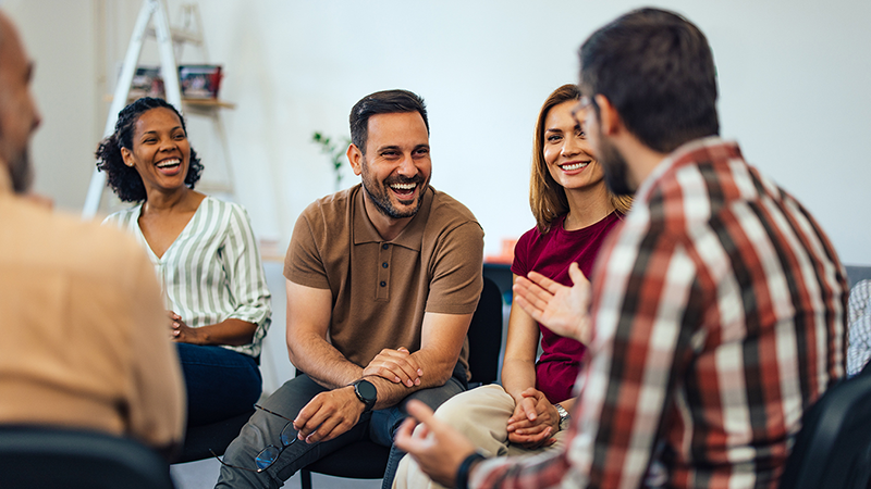 High performers chatting and inspiring each other to achieve