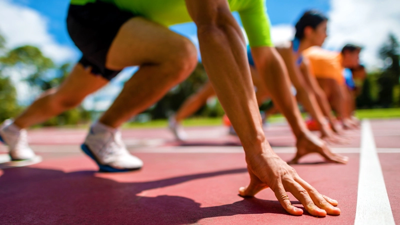 A high performance sprinter at the starting line ready to give it their best and win