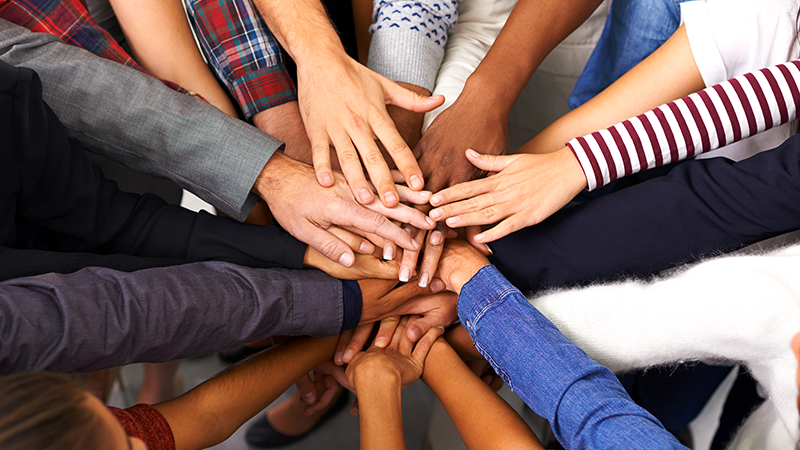 teamwork hands all in