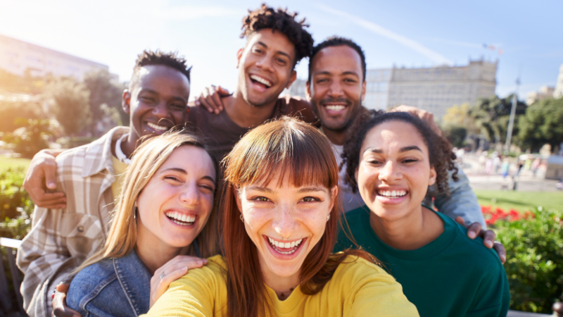 group of happy high performers working together
